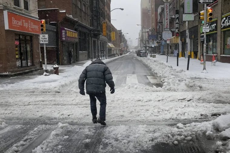 The slushy streets of Chinatown last March; feds say this might be a tame winter.