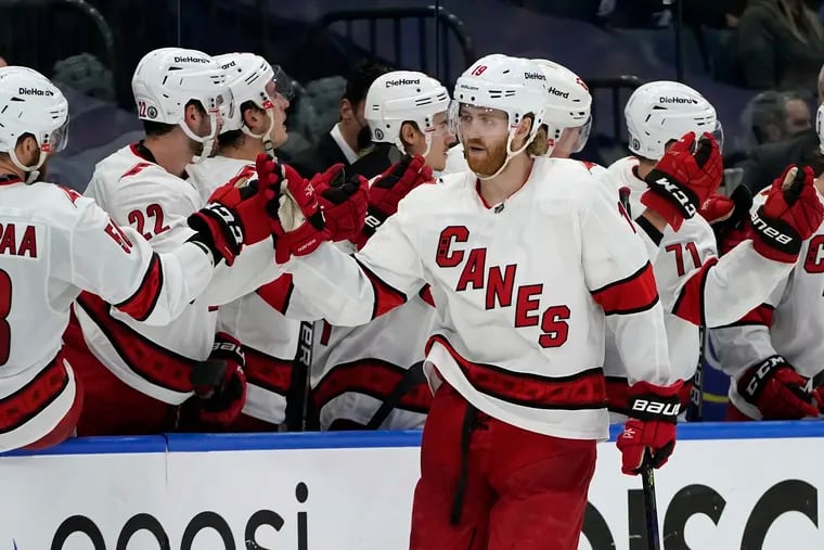 Carolina Hurricanes defenseman Dougie Hamilton celebrating with the bench after his goal against the Tampa Bay Lightning on June 5.
