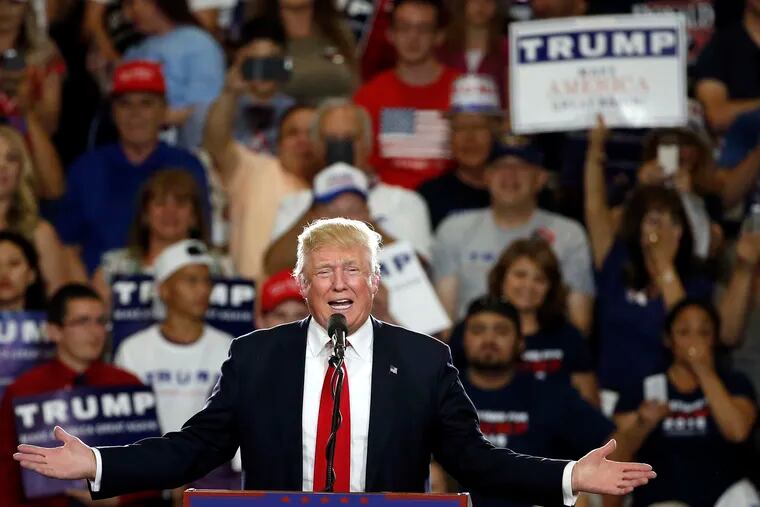 FILE - In this May 24, 2016 file photo, Republican then-presidential candidate Donald Trump speaks at a campaign event in Albuquerque, N.M. New Mexico law enforcement agencies are prepping for an upcoming Trump rally in Rio Rancho, N.M. on Monday, Sept. 16, 2019, three years after previous ones turned violent in Albuquerque. (AP Photo/Brennan Linsley, File)