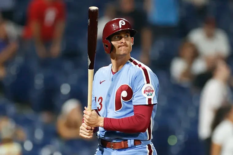Phillies first baseman Brad Miller walks back to the dugout after striking out with the tying run on base in the ninth inning to cap an 8-7 loss to the Arizona Diamondbacks on Thursday night at Citizens Bank Park.