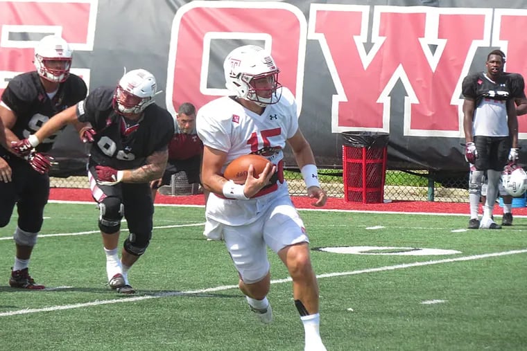 Temple QB Anthony Russo scrambles for a gain during Tuesday's practice.