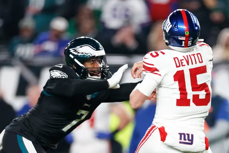 Eagles edge rusher Haason Reddick pressuring New York Giants quarterback Tommy DeVito on Dec. 25.