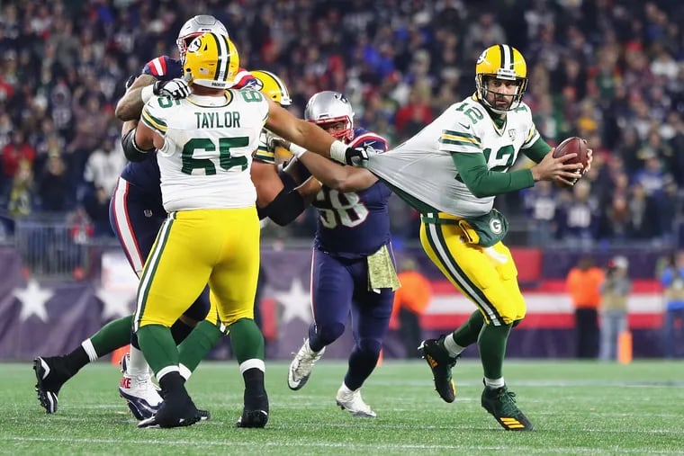 Green Bay Packers quarterback Aaron Rodgers (#12) should have no problem carrying his team to victory in Week 4 against the short-handed Patriots. (Photo by Maddie Meyer/Getty Images)
