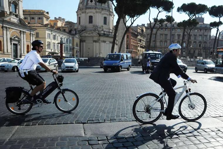 Ignazio Marino riding his bike through Rome, Italy. Marino, a former transplant surgeon at Jefferson Hospital is now the mayor of Rome.