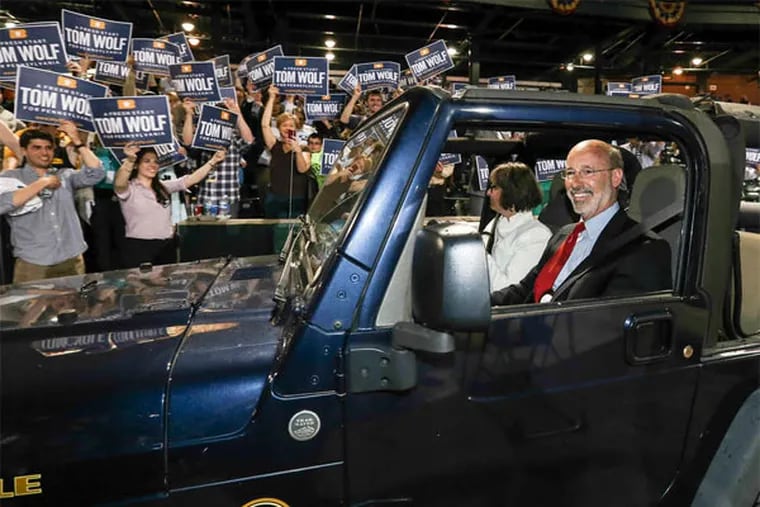 On primary night, the Democratic candidate for Pennsylvania governor, Tom Wolf, and his wife, Frances, leave festivities at Santander Stadium in York in the now-famous Jeep Wrangler. (Steven M. Falk / Staff Photographer)