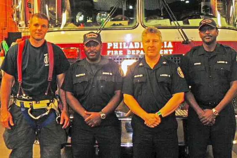 Members of Ladder 13 in Philadelphia, including (from left) Fred Hubbard, Clarence Whitfield, Capt. Richard Meagher, and Jeffery Stowe, received the Heroes Award of Valor.