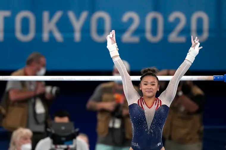 Sunisa Lee, finishes on the uneven bars during the artistic gymnastics women's all-around final at the 2020 Summer Olympics on Thursday.