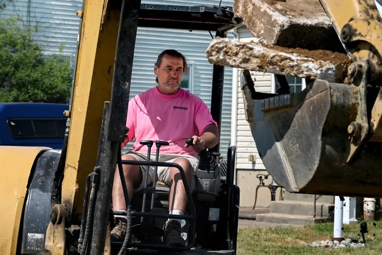 Concrete company owner Frank Bialowas working in Brooklawn, N.J., on May 31. He was inducted into the Phantoms Hall of Fame in 2005.