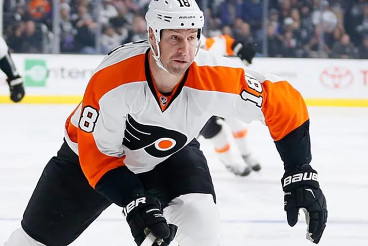 Philadelphia Flyers left wing R.J. Umberger skates with the puck against the Los Angeles Kings during the first period of an NHL hockey game, Saturday, Dec. 6, 2014, in Los Angeles. (Danny Moloshok/AP)