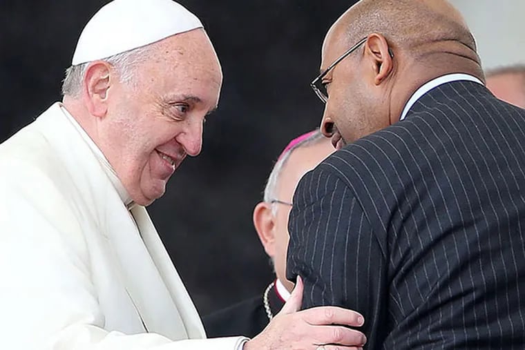 Mayor Nutter with Pope Francis in Vatican City last spring: The pope will return the favor when he visits Philly in September. DAVID MAIALETTI / STAFF PHOTOGRAPHER