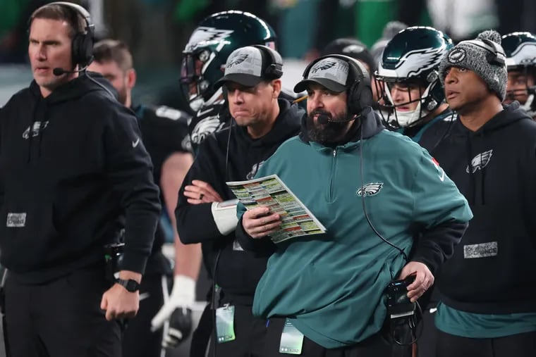 Eagles senior defensive assistant Matt Patricia (center right) watches as the Eagles play the Giants at Lincoln Financial Field in Philadelphia, Pa. on Monday, Dec. 25, 2023.