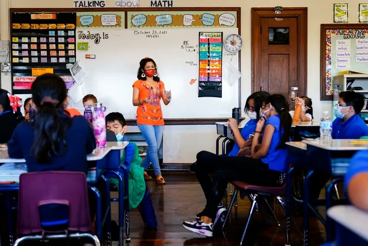 Student-teacher Olivia Vazquez leads students through their morning meeting at the Eliza B. Kirkbride School in Philadelphia on Oct. 20, 2021.