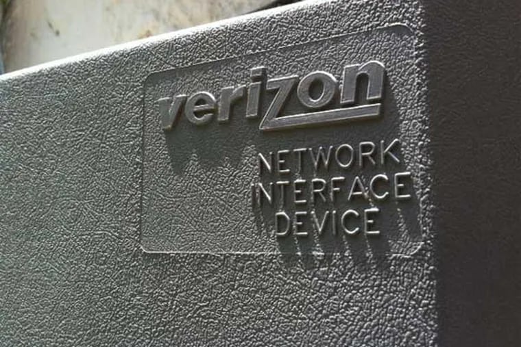 Verizon Network Interface Device -- a box mounted outside a residence in Broomall, Delaware County. June 2013. (Reid Kanaley / Staff)