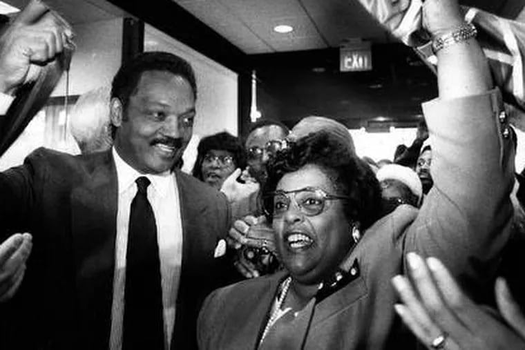 Mrs. Chappell celebrates with the Rev. Jesse Jackson at the opening of United Bank of Philadelphia in 1992.