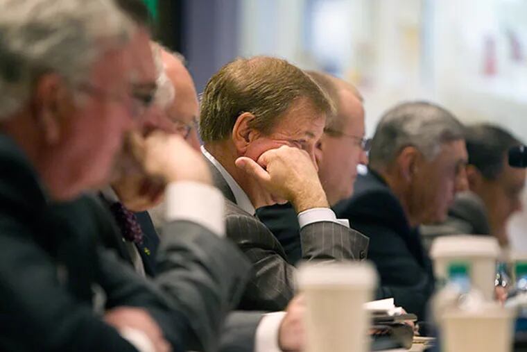 Six groups, including those headed by Steve Wynn and Bart Blatstein appeared before the PA Gaming Control Board lobbying for the second city gaming license. Here, members of the gaming control board listen to Steve Wynn's presentation.  ( ED HILLE / Staff Photographer )