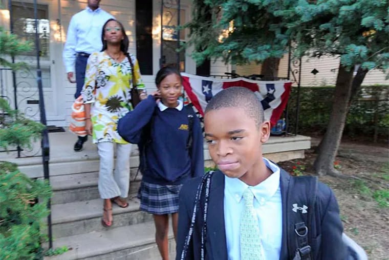 The family heads off to school and work. Steven Lindner says of his son: &quot;No matter where he goes, there's a perception: He's the black kid.&quot;
