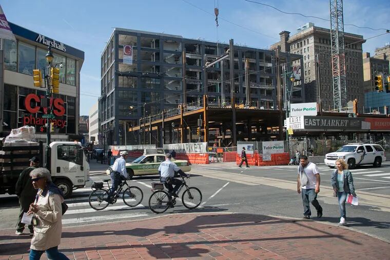Intersection of 11th and Market Streets, with new development on the southwest corner.