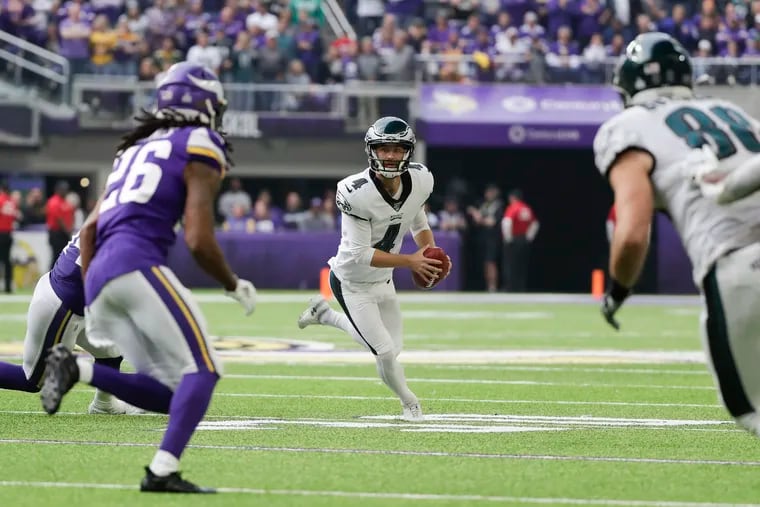 Eagles kicker Jake Elliott looks for a receiver during a late second-quarter fake field goal against the Minnesota Vikings on Sunday, October 13, 2019 in Minneapolis.