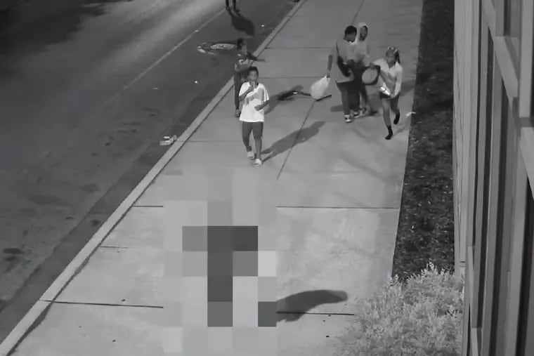 Philadelphia police release video of the traffic cone beating death of 73-year-old James Lambert Jr., who was attacked last June near 22nd Street and Cecil B. Moore Avenue. Gamara Mosley, 14, is holding the traffic cone. Mosley has been charged with third-degree murder and related offenses.