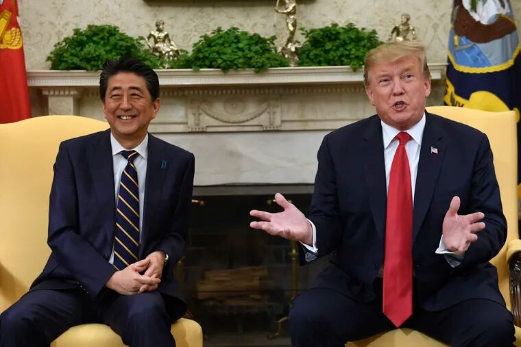 FILE - In this April 26, 2019, file photo, U.S. President Donald Trump, right, speaks while meeting with Japanese Prime Minister Shinzo Abe, left, in the Oval Office of the White House in Washington. Trump’s Japan visit starting on Saturday, May 25, 2019, is to focus on personal ties with Abe rather than substantive results on trade, security or North Korea. (AP Photo/Susan Walsh, File)