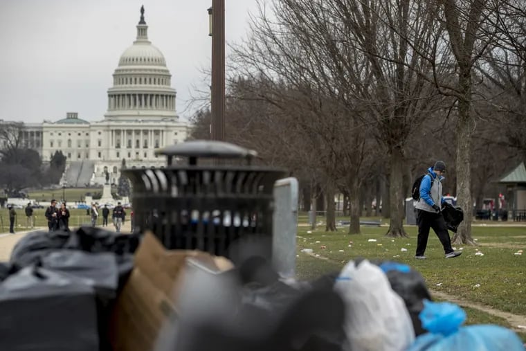 Garbage piles up on the National Mall in front of the Capitol building as the partial government shutdown approaches its third week.