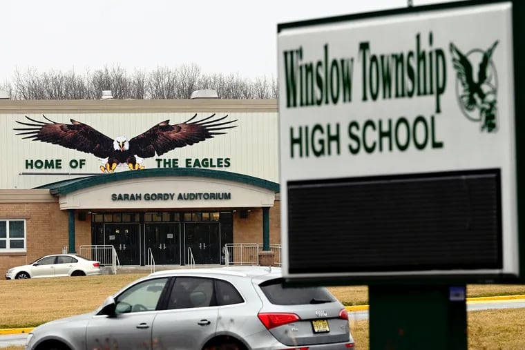 File: The Winslow Township School district has reached settlements for $6 million in two separate lawsuits filed by former students who say they were sexually abused by a former high school teacher. Each man will get $3 million.
