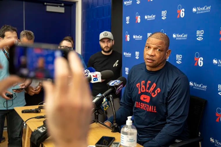 Sixers coach Doc Rivers speaks with the press after practice Tuesday in Camden.