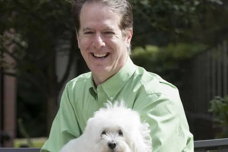 Rich Milgram of Nexxt with his dog, Twizzler.