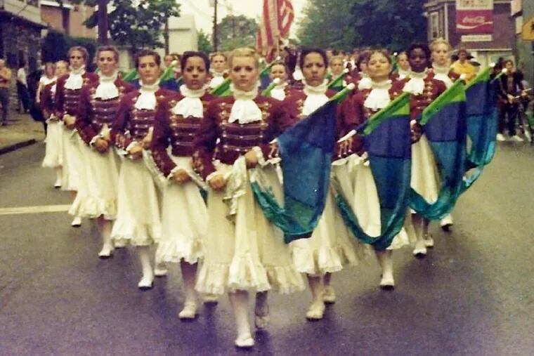 Debra Barcus (center), Lee Ann Riley (to her left) and Linda Riley (to her right) all were members of The Cadets color guard in the 1980s. All three women say they were sexually abused by George Hopkins, the corps longtime director. Photo courtesy of Debra Barcus