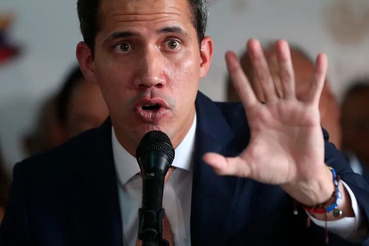 Opposition Assembly President Juan Guaido, who declared himself the interim-president of Venezuela, gives a press conference concerning the previous night's arrest of an opposition lawmaker in Caracas, Venezuela, Thursday, May 9, 2019. The arrest of Edgar Zambrano, vice president of the opposition-controlled National Assembly, appeared to be part of a carefully calibrated crackdown on the opposition by President Nicolas Maduro's government. (AP Photo/Martin Mejia)