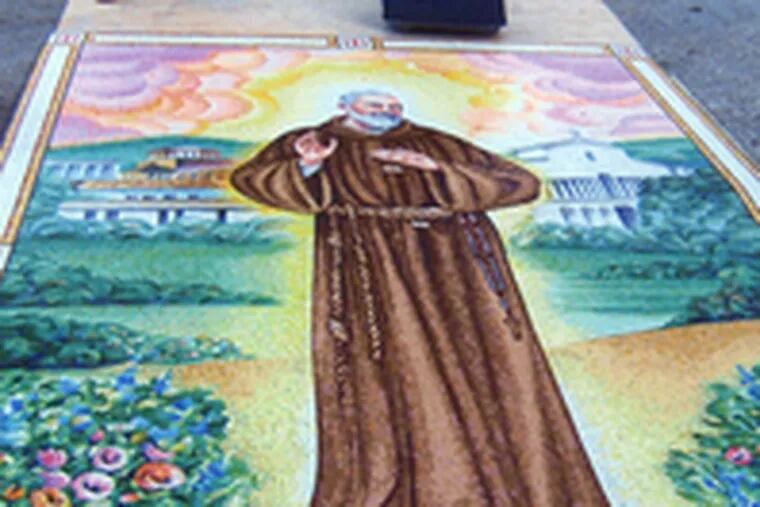 Stained-glass rendering of Italian saint Padre Pio (right), valued at $100,000, was lost when the van it was in was stolen at the airport.