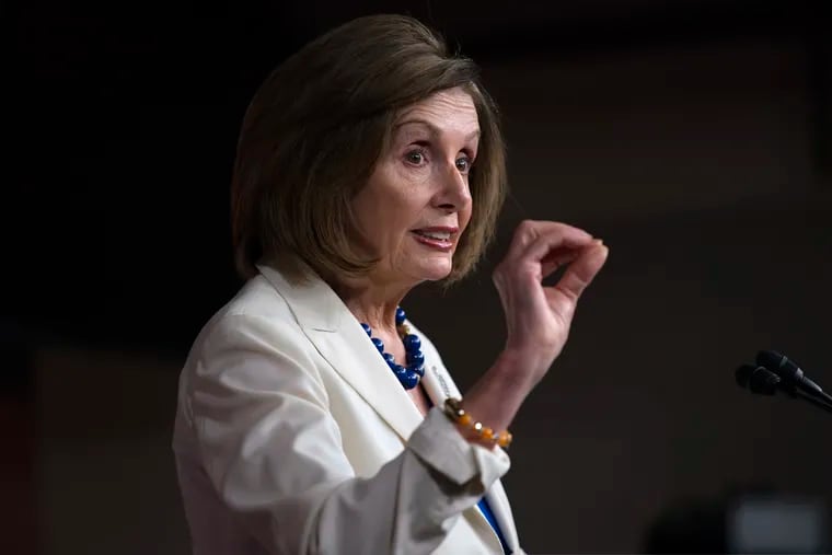 Speaker of the House Nancy Pelosi, D-Calif., talks to reporters as the House Intelligence Committee holds public impeachment hearings of President Donald Trump's efforts to tie U.S. aid for Ukraine to investigations of his political opponents.