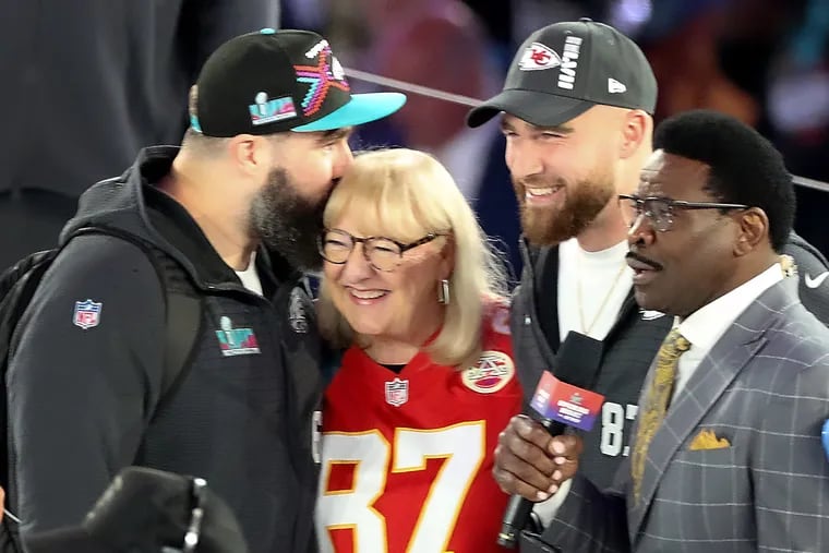 Eagles center Jason Kelce (left, kissing mom, Donna) and his brother, Kansas City Chiefs tight end Travis Kelce, facing off in the Super Bowl is among the game's biggest story lines.