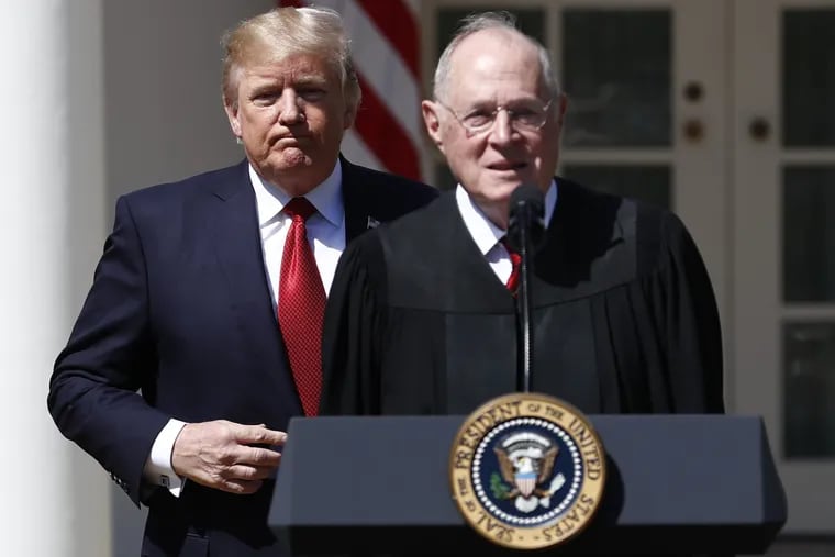 President Donald Trump, left, and Supreme Court Justice Anthony Kennedy participate in a public swearing-in ceremony for Justice Neil Gorsuch in the Rose Garden of the White House White House in Washington last April. The 81-year-old Kennedy said , that he is retiring after more than 30 years on the court.