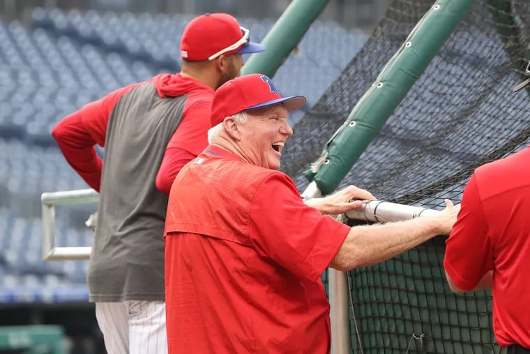 The Phillies fired their hitting coach John Mallee, hired former manager, Charlie Manuel, to replace him.  Maunel, center, has a laugh during batting practice at Citizens Bank Park on Aug. 14, 2019.