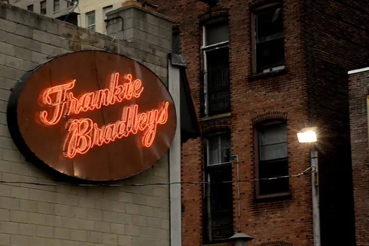 The restored original neon sign (with the original spelling) outside Franky Bradley's in Midtown Village.