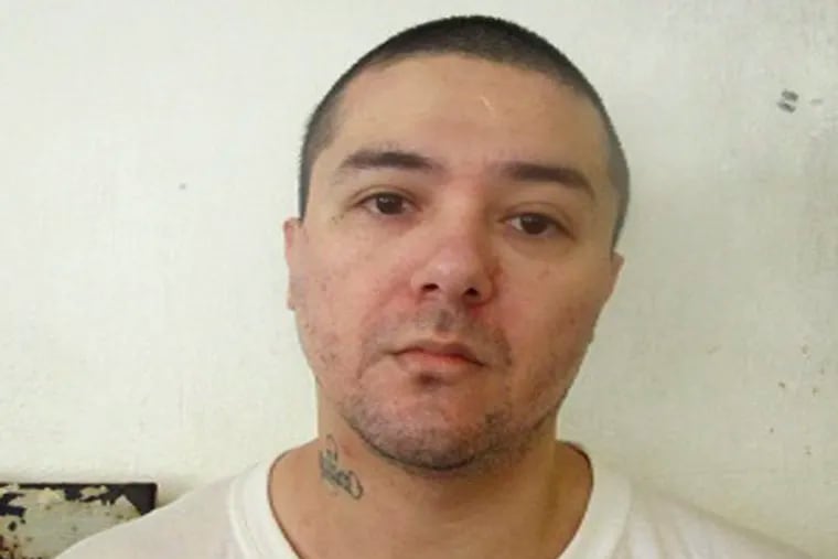 This undated photo provided by the Oklahoma Department of Corrections shows Raymond Pillado. Pillado a convicted killer, is a suspect in the death of his cellmate Anthony Palma. Prison officials say Palma was killed in his cell Friday, Jan. 11, 2019,  at the Oklahoma State Penitentiary in McAlester, Okla. (Oklahoma Department of Corrections via AP)