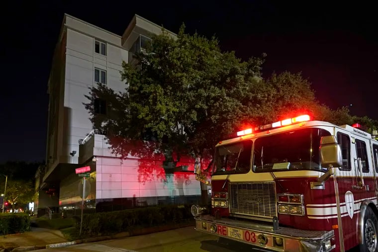 A firetruck is positioned outside the Chinese Consulate in Houston on Wednesday.