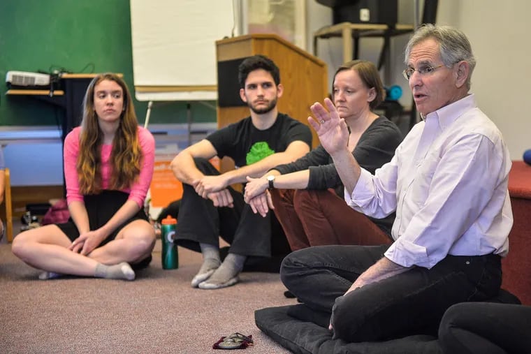 Jon Kabat-Zinn, who pioneered a stress-reduction technique, leads a meditation workshop during a visit to his alma mater, Haverford College. He later suggested to college leaders they “teach students the dualism of success and failure.”