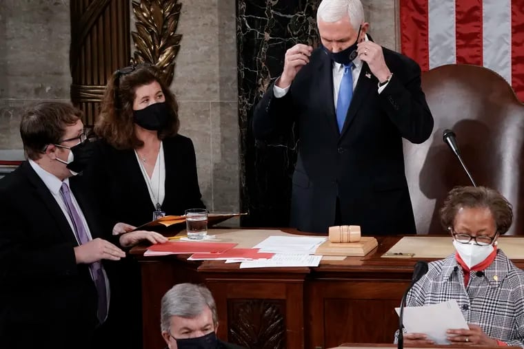 Senate Parliamentarian Elizabeth MacDonough, left, works beside Vice President Mike Pence during the certification of Electoral College ballots in the presidential election in January.
