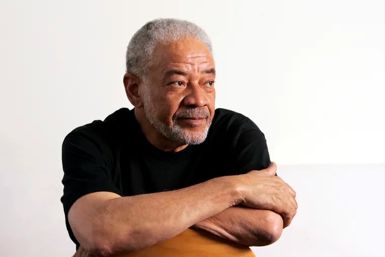 In this June 21, 2006 file photo, singer-songwriter Bill Withers posed in his office in Beverly Hills, Calif.