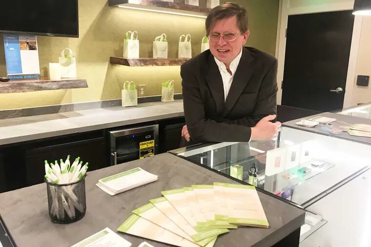 Val Gorski, CFO of TerraVida Holistic Centers, stands behind the counter in the customer consultation at the Abington dispensary on Old York Road.  The medical marijuana dispensary opened April 26.