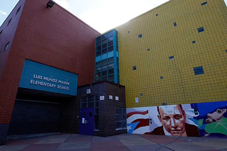 Parents and education advocates are fighting the school district's efforts to give Aspira Inc. of Pennsylvania control of Luis Munoz-Marin Elementary in North Philadelphia. (Yong Kim/Staff)