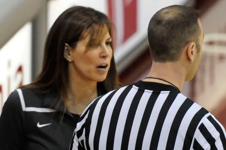 Neumann-Goretti girls' coach Letty Santarelli has words with an official. She resigned Friday. RON TARVER / Staff
