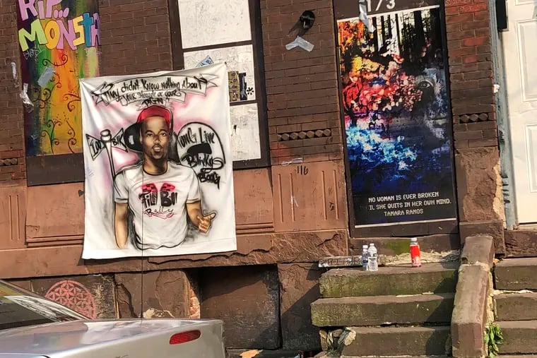 A bedsheet memorial for Unique "Boogie" Anderson, 18, slain May 27 in Trenton. He was one of 16 people shot over the Memorial Day weekend. In response, federal, state and local law enforcement officials have formed a new partnership to fight crime in New Jersey's capital.