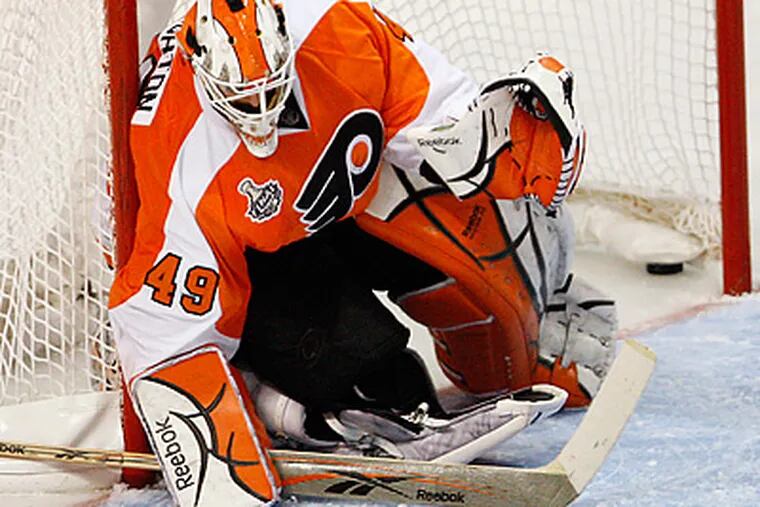 Flyers GM Paul Holmgren said Michael Leighton could practice Thursday "at the earliest." (David Maialetti/Staff file photo)