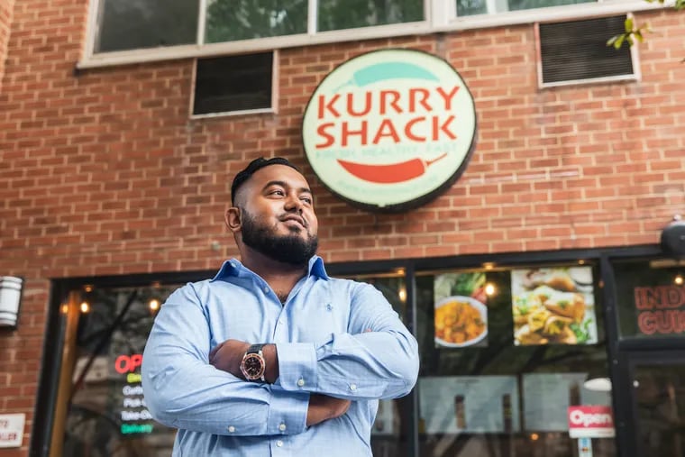 Shafi Gaffar outside the Kurry Shack restaurant at 21st and Chestnut Streets.