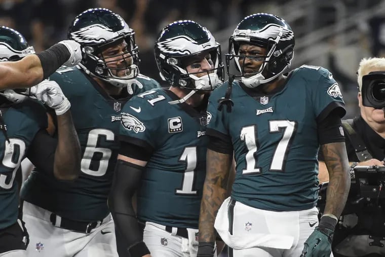 Eagles wide receiver Alshon Jeffery (17) celebrates with teammates after scoring a touchdown  against the Cowboys.
