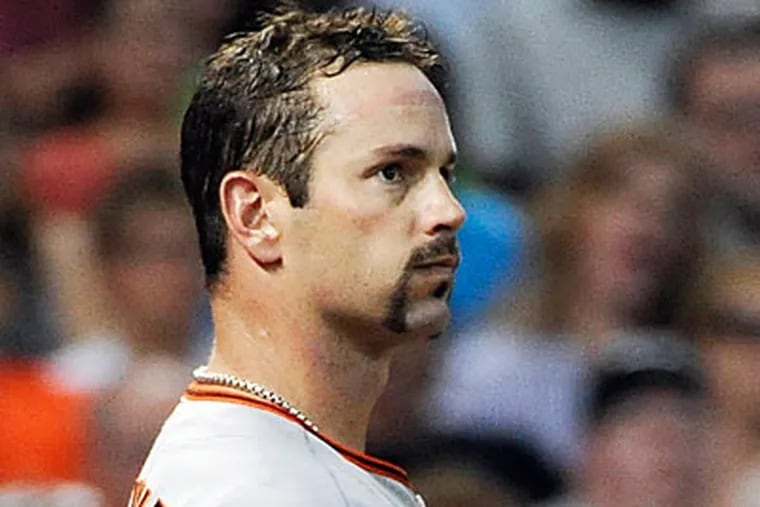 Aaron Rowand, 34, hit .233 with four homers in 108 games for San Francisco last season. (Pat Sullivan/AP Photo)