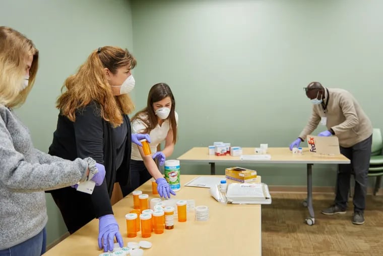 At Washington University School of Medicine in St. Louis, lab staffers filled jars with the drug fluvoxamine for a 2020 study of whether the medicine works against COVID-19.
